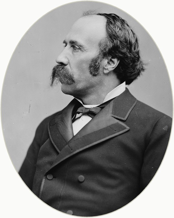 Oval-cropped studio portrait of Horace Tabor in a dark coat, facing left, 1870s
