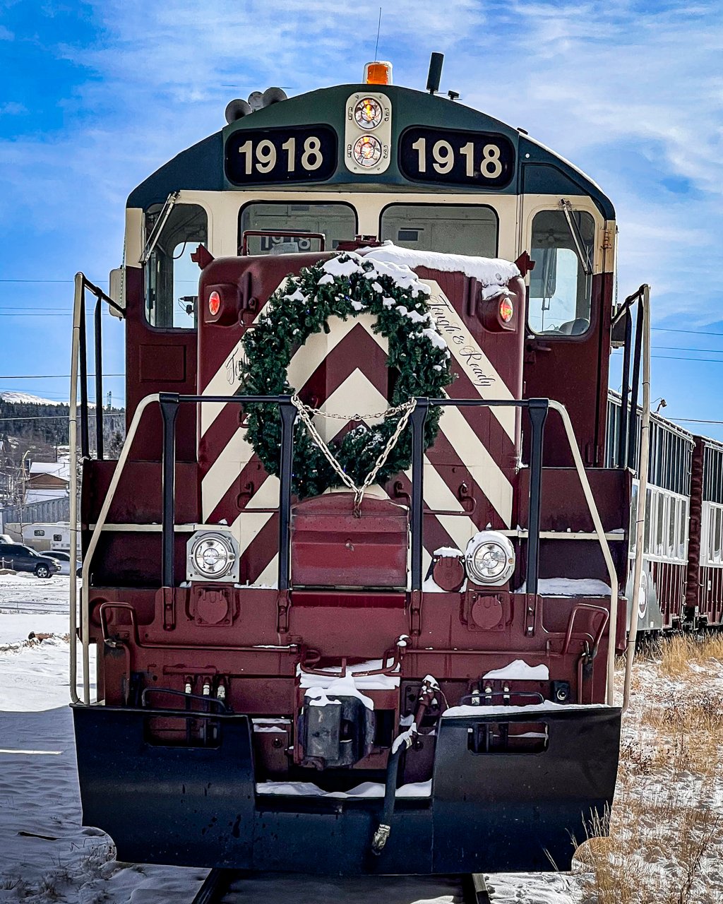 Leadville Railroad locomotive 1918 with a holiday wreath on its nose, ready for the Winter Express
