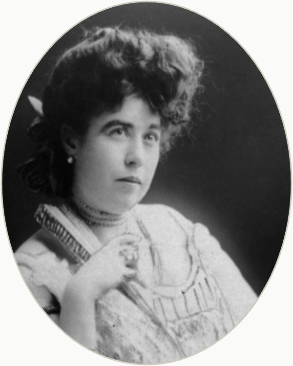 Oval-cropped portrait of Margaret Molly Brown looking to the right, in a light blouse